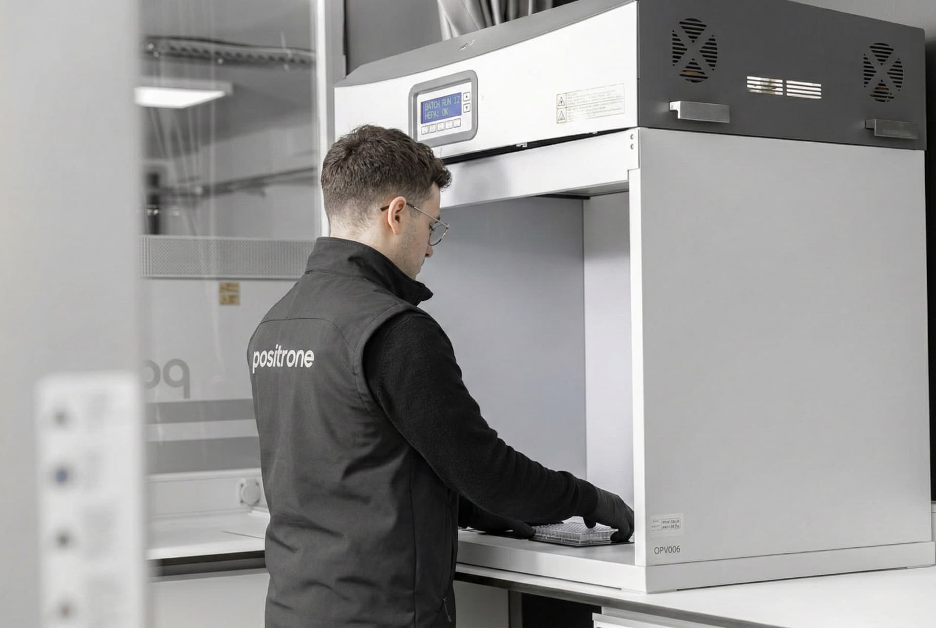 Emissions testing setup with fume hood and ducting